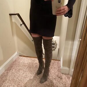 Green designer suede boots